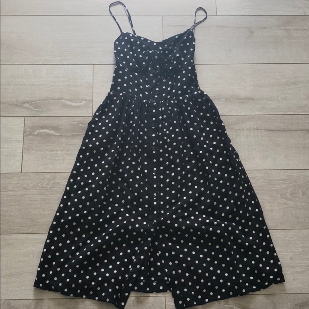 Black dress with white polka dots